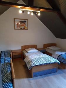 Postel nebo postele na pokoji v ubytování Maison Bretonne 8 personnes en Côtes D'Armor