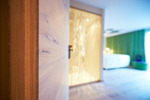 a close up of a wooden door in a room at Hotel-Restaurant Schwanen in Metzingen