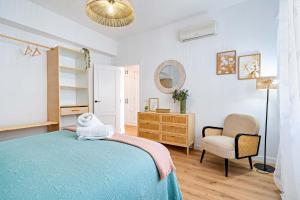 En eller flere senge i et værelse på APARTAMENTO BELLAVISTA beach