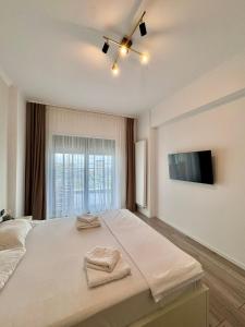 TV/trung tâm giải trí tại Casa Del Mar Lamera Residence