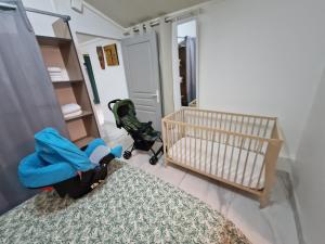 Rúm í herbergi á Plézi Location F3 au bord de mer, Trois-Ilets