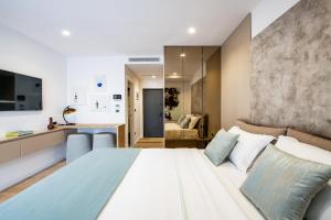 Vuode tai vuoteita majoituspaikassa Marina Studio Apartment