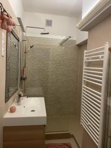 Kúpeľňa v ubytovaní Syl Via Apartman