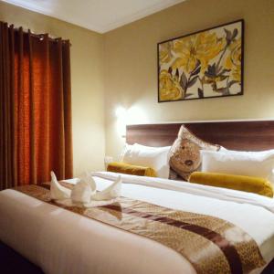 Postel nebo postele na pokoji v ubytování Etang Guesthouse + 32 fotografií