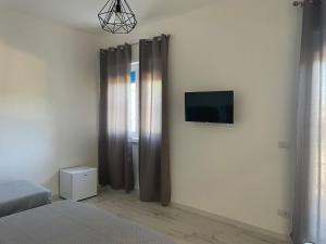 TV a/nebo společenská místnost v ubytování Maison appartaments