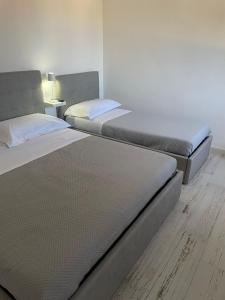 Postel nebo postele na pokoji v ubytování Maison appartaments
