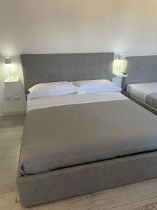 Postel nebo postele na pokoji v ubytování Maison appartaments