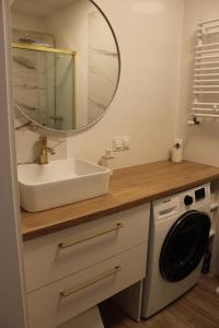 Koupelna v ubytování Apartament MEWA ul. Kasprowicza 20B/608