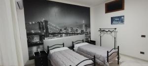 Кровать или кровати в номере Casa Emma 121