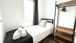 Postel nebo postele na pokoji v ubytování Centro con terraza blco by Prestigi