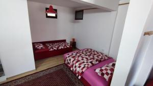 Postel nebo postele na pokoji v ubytování Apartments Dino