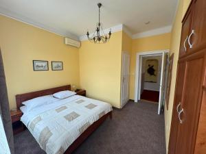 Postel nebo postele na pokoji v ubytování Ada Apartments