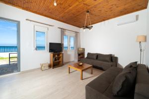 TV a/nebo společenská místnost v ubytování Vista di mare + 25 fotografií