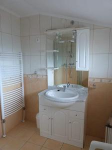 Kúpeľňa v ubytovaní Andi Apartman