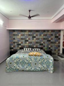 Katil atau katil-katil dalam bilik di PARVATHY MURUGAN COTTAGE-2ND FLOOR