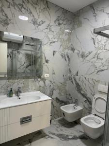 Vannituba majutusasutuses Sun Hill Green Coast, Palase +16 fotot