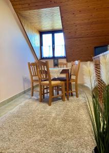 Posedenie v ubytovaní Vamos Apartman