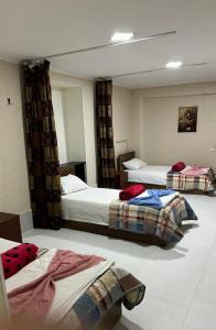 Кровать или кровати в номере Hostel FORREST