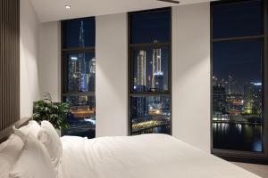 Letto o letti in una camera di Esclusive 1BR full Burj Khalifa View