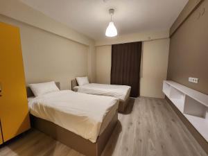 Postel nebo postele na pokoji v ubytování Moda Hotel + 37 fotografií