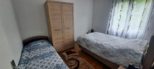 Un pat sau paturi într-o cameră la Boka Bay