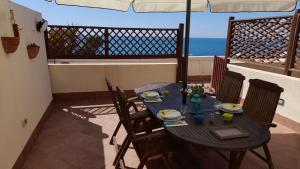 Φωτογραφία από το άλμπουμ του Casa vacanze con terrazza panoramica vista mare σε Portu Maga