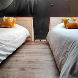 Postel nebo postele na pokoji v ubytování Malalcahuello Eco Glamp