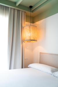 Postel nebo postele na pokoji v ubytování Rooms by JovA
