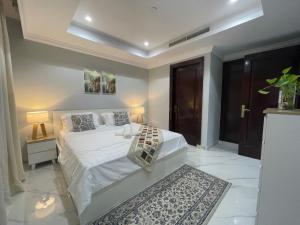 Letto o letti in una camera di 2 BHK Townhouse at Pearl