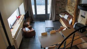 an overhead view of a living room with a table and chairs at Les Fermes de Cal Panche : Le Cabanat in Les Angles