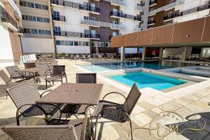 Bazén v ubytování Spazzio diRoma RM Hospedagem com Acesso Acqua Park/Splash nebo v jeho okolí