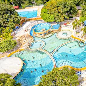 Bazén v ubytování Spazzio diRoma RM Hospedagem com Acesso Acqua Park/Splash nebo v jeho okolí