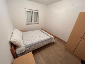 Posteľ alebo postele v izbe v ubytovaní Apartman Caminito