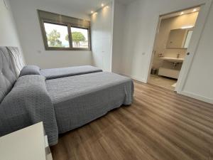 En eller flere senger på et rom på Casa la Mar Salada