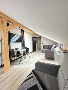 Posezení v ubytování Domki i apartamenty Skandynawia z basenem