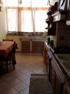 Kuchyňa alebo kuchynka v ubytovaní La Casa del Sole