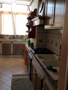 Kuchyňa alebo kuchynka v ubytovaní La Casa del Sole