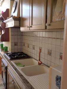 Kuchyňa alebo kuchynka v ubytovaní La Casa del Sole