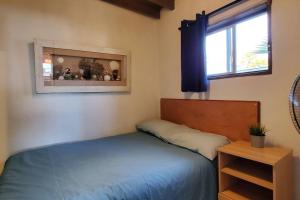 Katil atau katil-katil dalam bilik di CASA SURF - BEACHFRONT LIVING