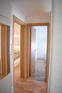 Postel nebo postele na pokoji v ubytování Apartman Nina