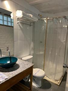Uma casa de banho em Perla Suites Malecón