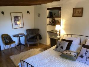 Postel nebo postele na pokoji v ubytování Phèdre en Saône