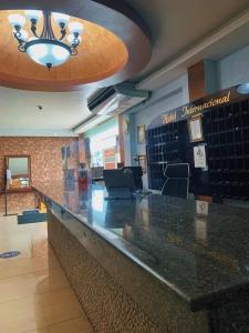 a bar in a gym with a large counter at Hotel Internacional de Colón in Colón