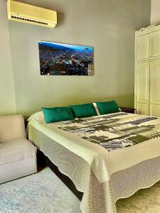 Postel nebo postele na pokoji v ubytování Casa Hotel Impacto