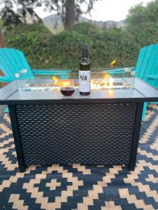 a bottle of wine sitting on top of a table at The Landmark Inn on Orcas Island in Eastsound