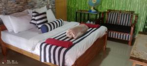 Postel nebo postele na pokoji v ubytování Secret View Homestay Ella