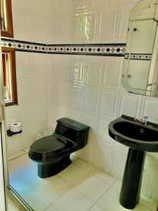 Koupelna v ubytování Casa Hotel Impacto