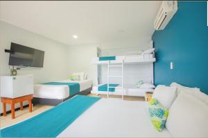 Postel nebo postele na pokoji v ubytování Greenview Medellin By St Hoteles