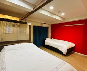 Krevet ili kreveti u jedinici u okviru objekta BOSS TAMAGAWA