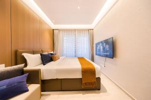 TV/trung tâm giải trí tại Xi Ke Executive Apartment - Shenzhen Futian Exhibition Center
